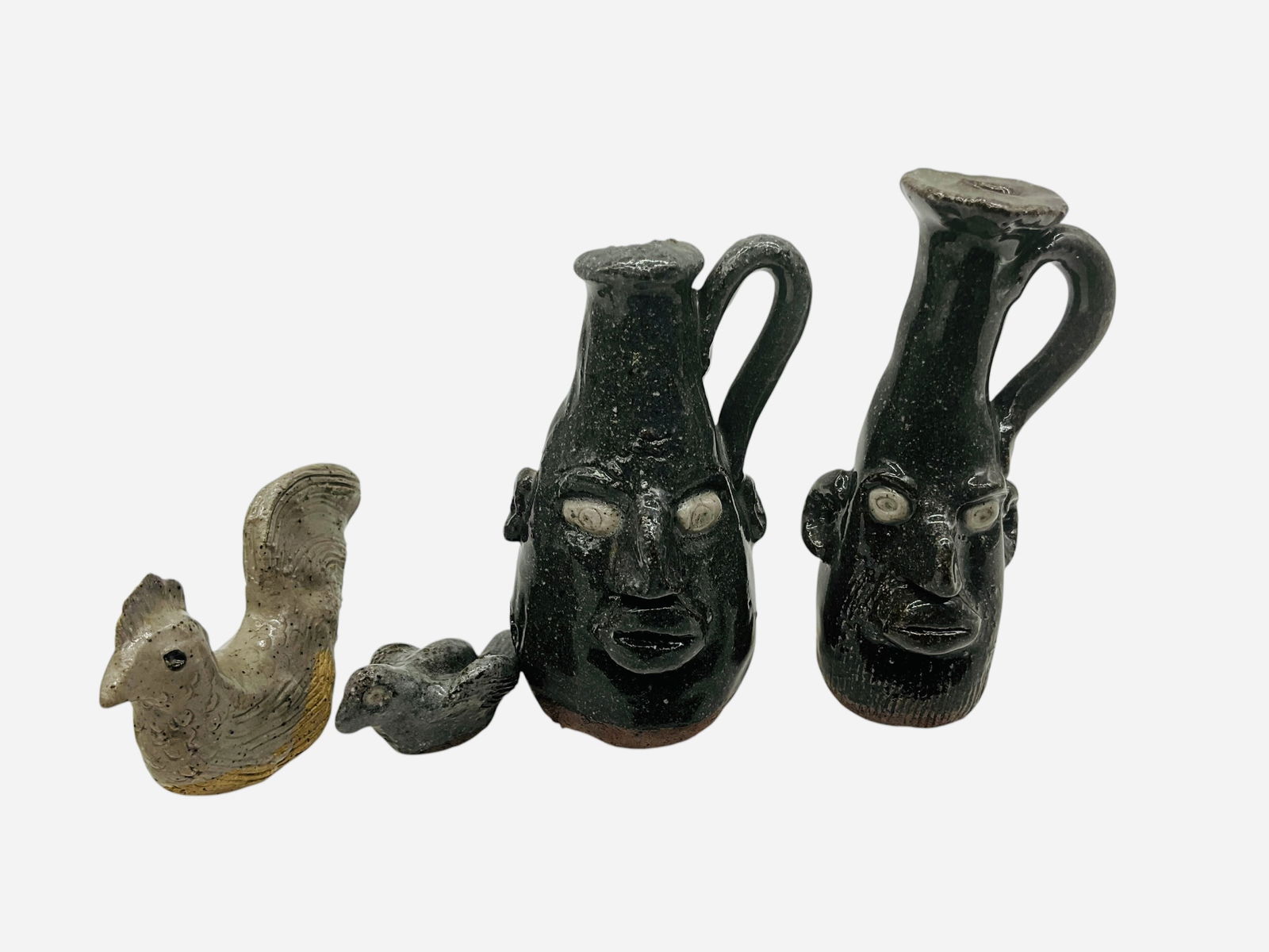 Four Mini Works - Pauline Crocker: Four minis total. All in mint condition and initialed. Two mini face jugs and two mini birds. Largest piece stands 3 inches. Smallest piece stands 0.75 inches.