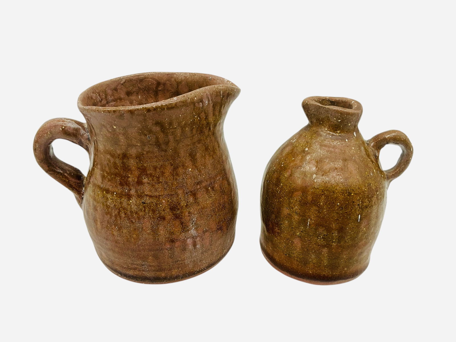 Two Early Rex Hogan Works: Mint condition. Both pieces signed and dated 9/02 on bottom. Pitcher stands 4.5 inches tall. Jug stands 4 inches tall.