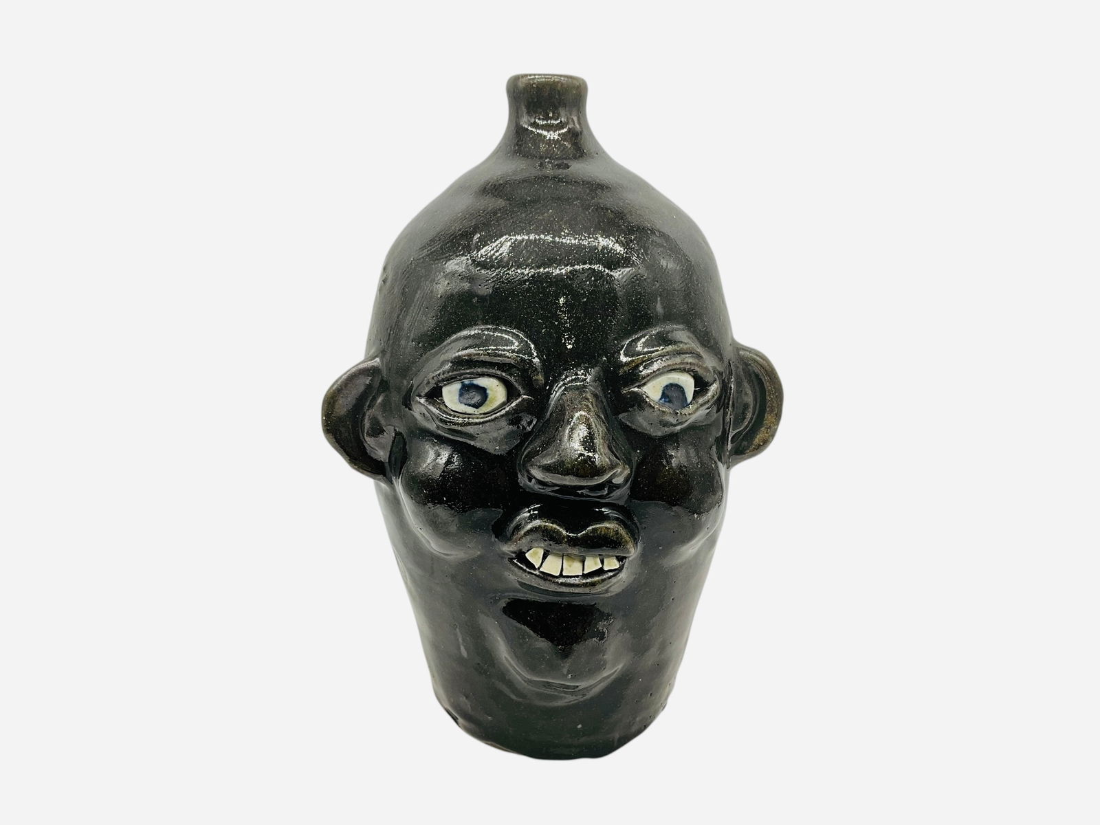 Grace Nell Hewell Princess Diana Face Jug Tribute: Mint condition. Signed and dated on bottom. Incised on body reads, "Diana Princess of Wales, Queen of Hearts, Loved by the World. 1961 - 1997." Measures 11.5" H x 8" L x 7" W.