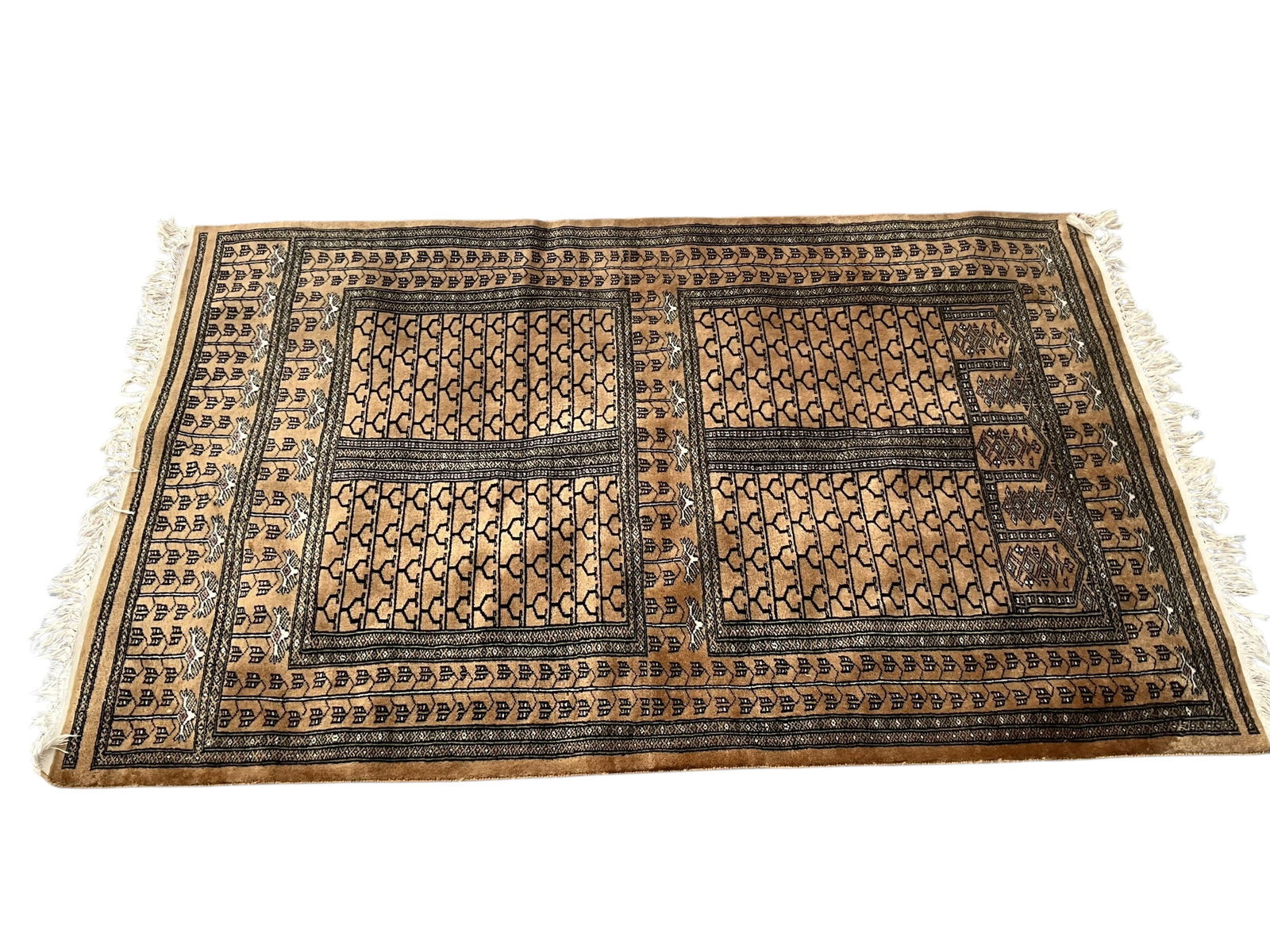 Large Brown Rug Unknown Maker: Measures 77 x 48 inches. Good condition.