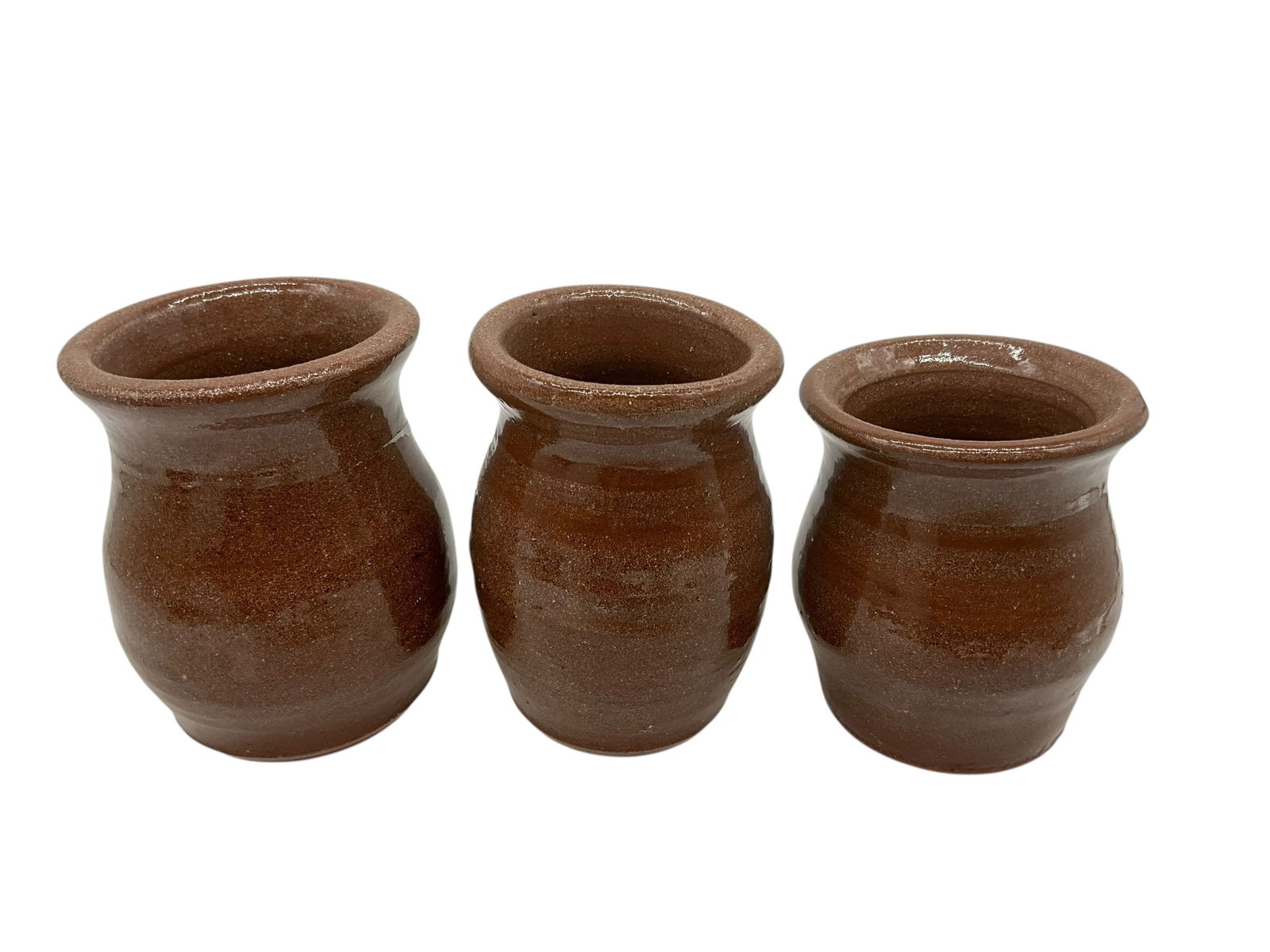 Three Ruby Meaders Vases: Mint condition. Signed and dated 2000 on bottom of each. Largest stands 4.25 inches. Smallest stands 3.75 inches.