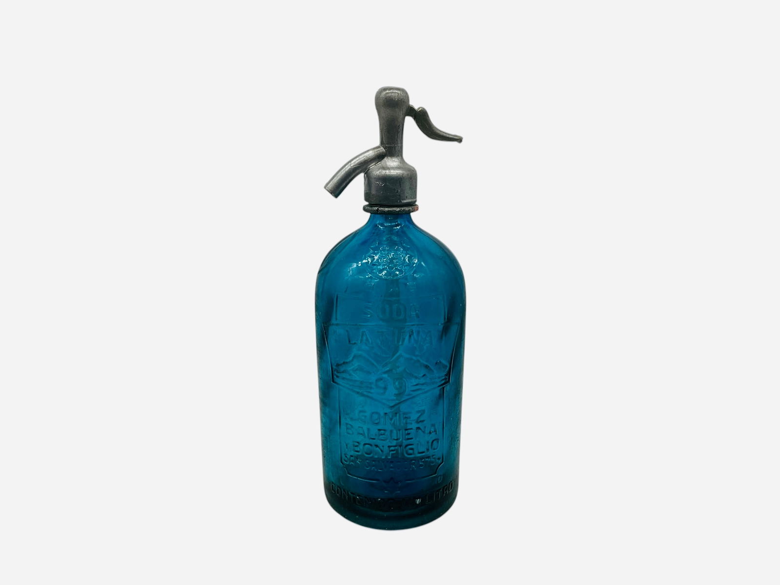 Blue Glass Seltzer Soda Water Bottle - 99 La Tuna: Excellent condition. A few small chigger bites at base. Embossed wording and graphics on both sides. 99 Soda La Tuna Gomez Balbuena y Bonfiglio San Salvador. Nozzle marked Bs.As. Measures 12"H x 4"L x