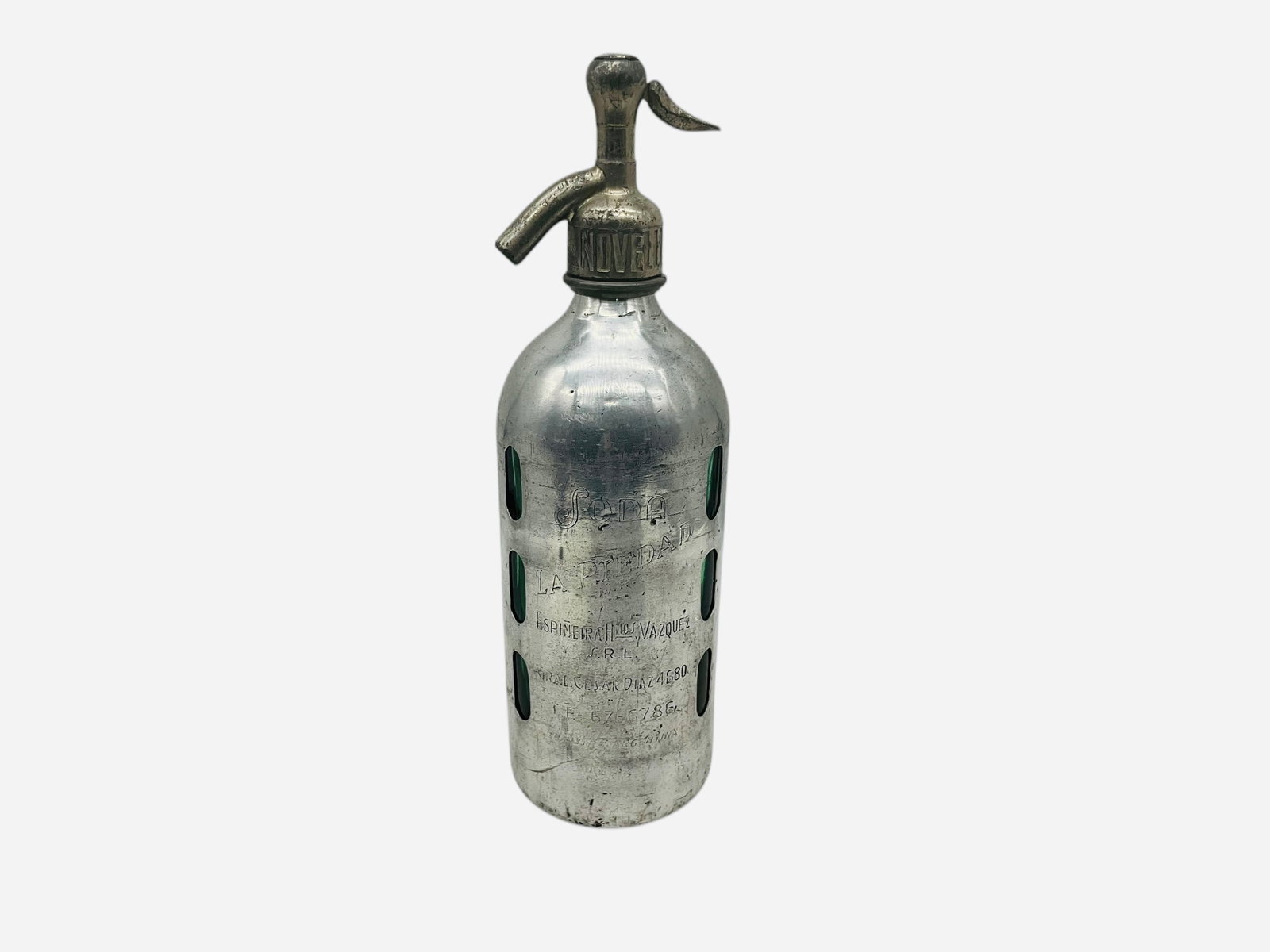 Art Deco Glass Aluminum Seltzer Bottle: Excellent condition. Marked Soda La Piedad. Nozzle marked Novelli y Borgarelli. Measures 12"H x 3.5"L x 3.5"W.