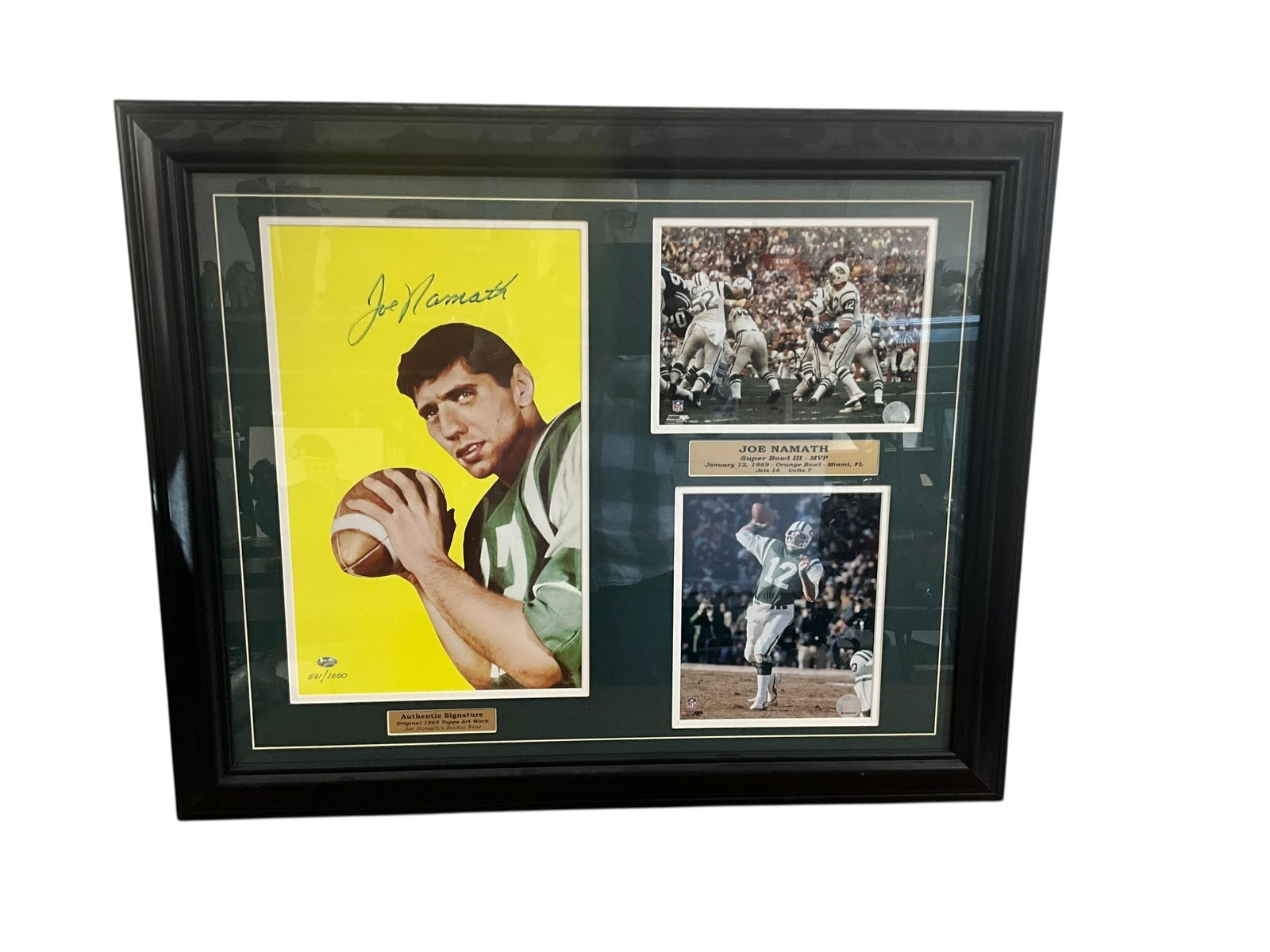 Framed Joe Namath Signed Rookie Card Lithograph & Photos LOA: Excellent condition. Matted and framed. Autographed large lithograph of rookie card. Two NFL photos. Lithograph numbers 591/1000. Measures 26.25" x 32.25".