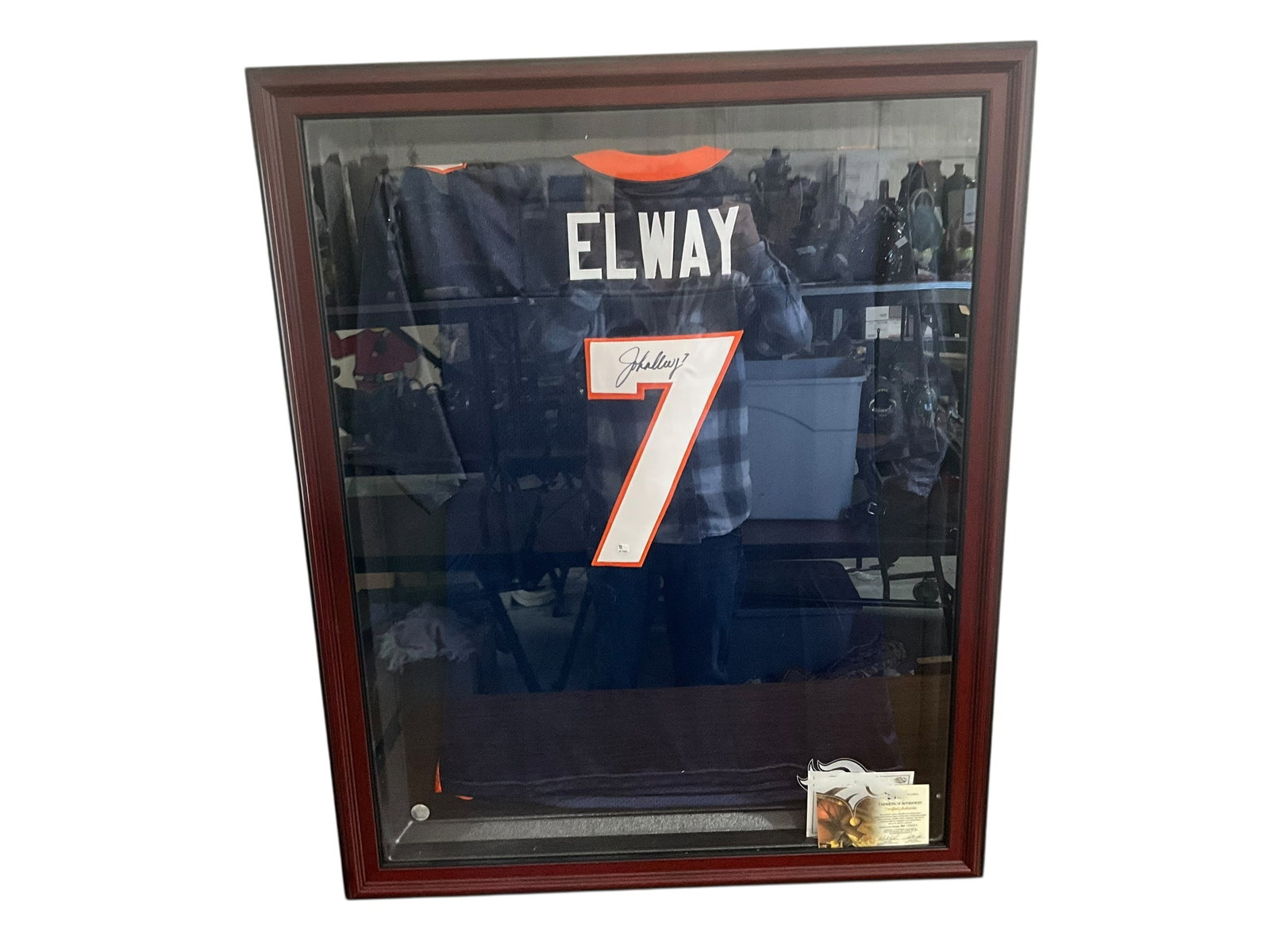 Autographed John Elway Jersey in Showcase - COA Included: Excellent condition. Mahogany Caseworks Jersey Show Case . Stacks of Plaques COA and Global Authentication Inc. COA included. Measures 42" x 34.5".