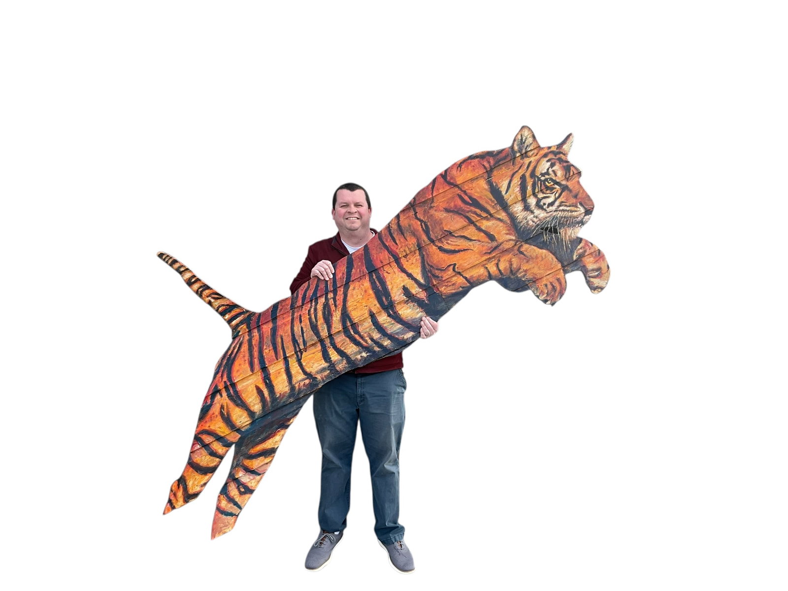 Giant Blake Gardner Folk Art Tiger "The Leap": A great folk art, carnival-esque piece from Blake Gardner in 2010. Made out of wood and measures in at a whopping 8 feet long and 4 feet tall. Back feet detached and easily reattached. No shipping on
