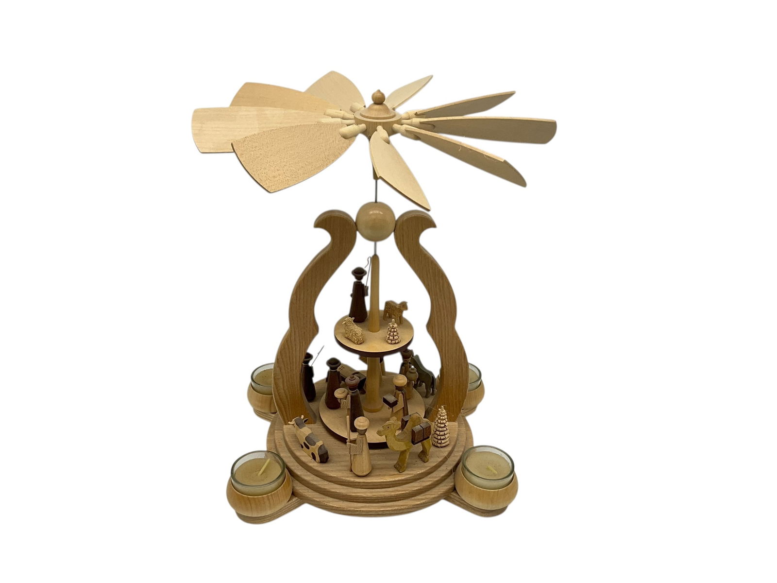 Muller Bow Design Two Tier Christmas Pyramid: Excellent condition. Sticker on bottom. Stands 13 inches tall and 11 inches in diameter.