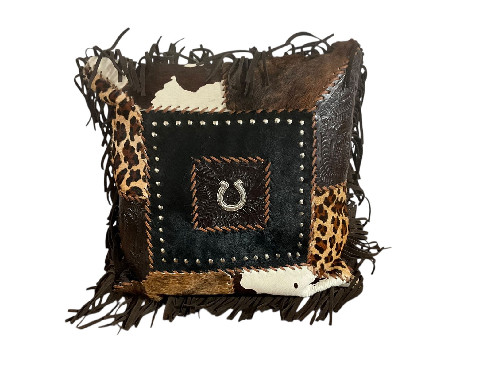 American West Home Leather & Animal Hide Pillow: Excellent condition. Sterling silver horseshoe (2"x2") in middle. Tag on back. Pillow measures 18" x 18".