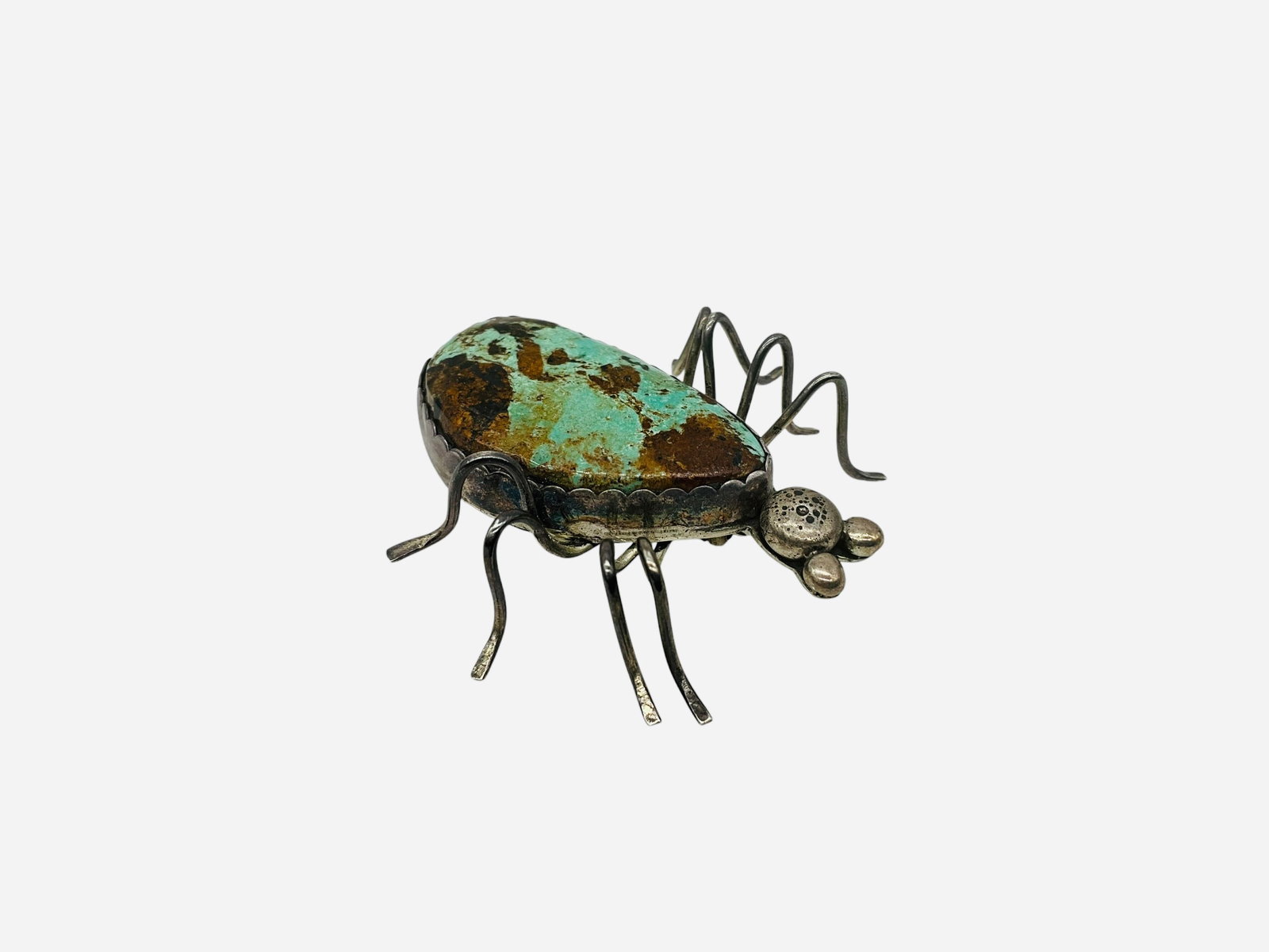 Turquoise Navajo Spider Brooch: Great condition. 1.75 inches long. Large turquoise stone as body. Unsigned.