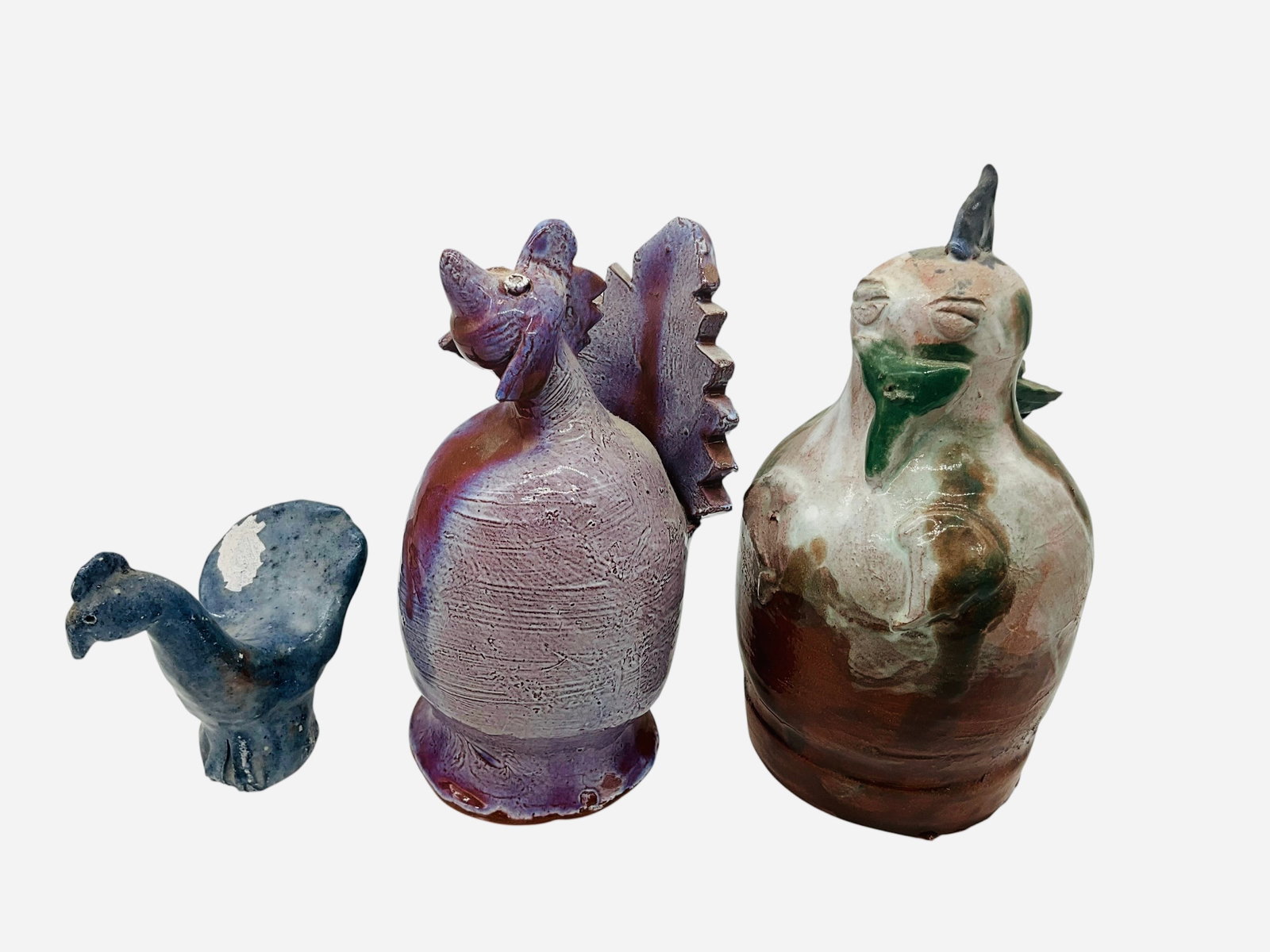 Three Folk Pottery Birds: All in good condition. Glaze flake on one piece. Buying three folk pottery birds for one money. Jamie Ferguson measures 5.5 inches tall. Mary Ferguson measures 3.5 inches tall. Andy Brown measures 6.2