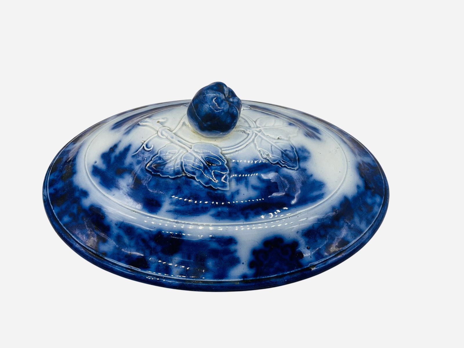 Flow Blue Ironstone Floral Lid: Mint condition. Great floral decorations at top near finial. Measures 10.5 inches by 7.5 inches.