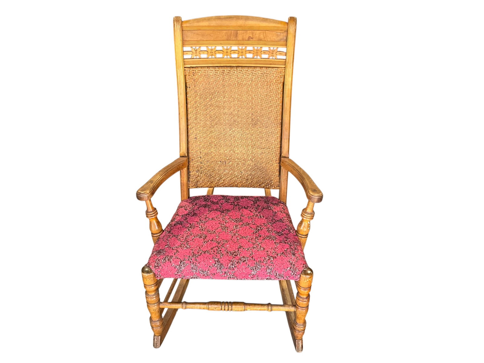Vintage Rocking Chair with Cane Back: A great oak rocking chair with women cane back. Top of the back features carved floral decorations. Great condition. 37.5 inches tall. No Shipping on this item. 