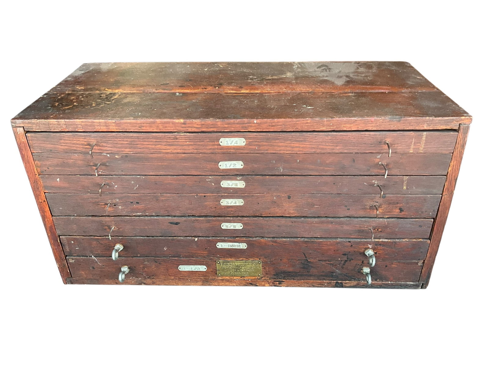 Early Wooden Foundry Shop Flat Drawer Cabinet: Great condition. Seven flat drawers all with square cubbies. Brass tag reads, "Freeman Supply Co. Pattern Shop & Foundry Supplies & Equipment Toledo Ohio" Would be great as a watchmakers