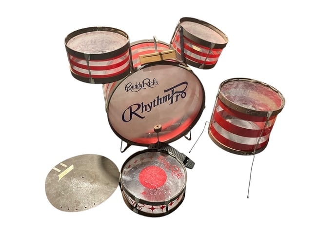 Buddy Rich RhythmPro Childs Drum Set - Noble & Cooley: A great set branded by the infamous Buddy Rich. Child's set made by Noble & Cooley sometime in the early 1980's. Overall good condition. Missing the cowbell, snare stand and cymbal stand. All