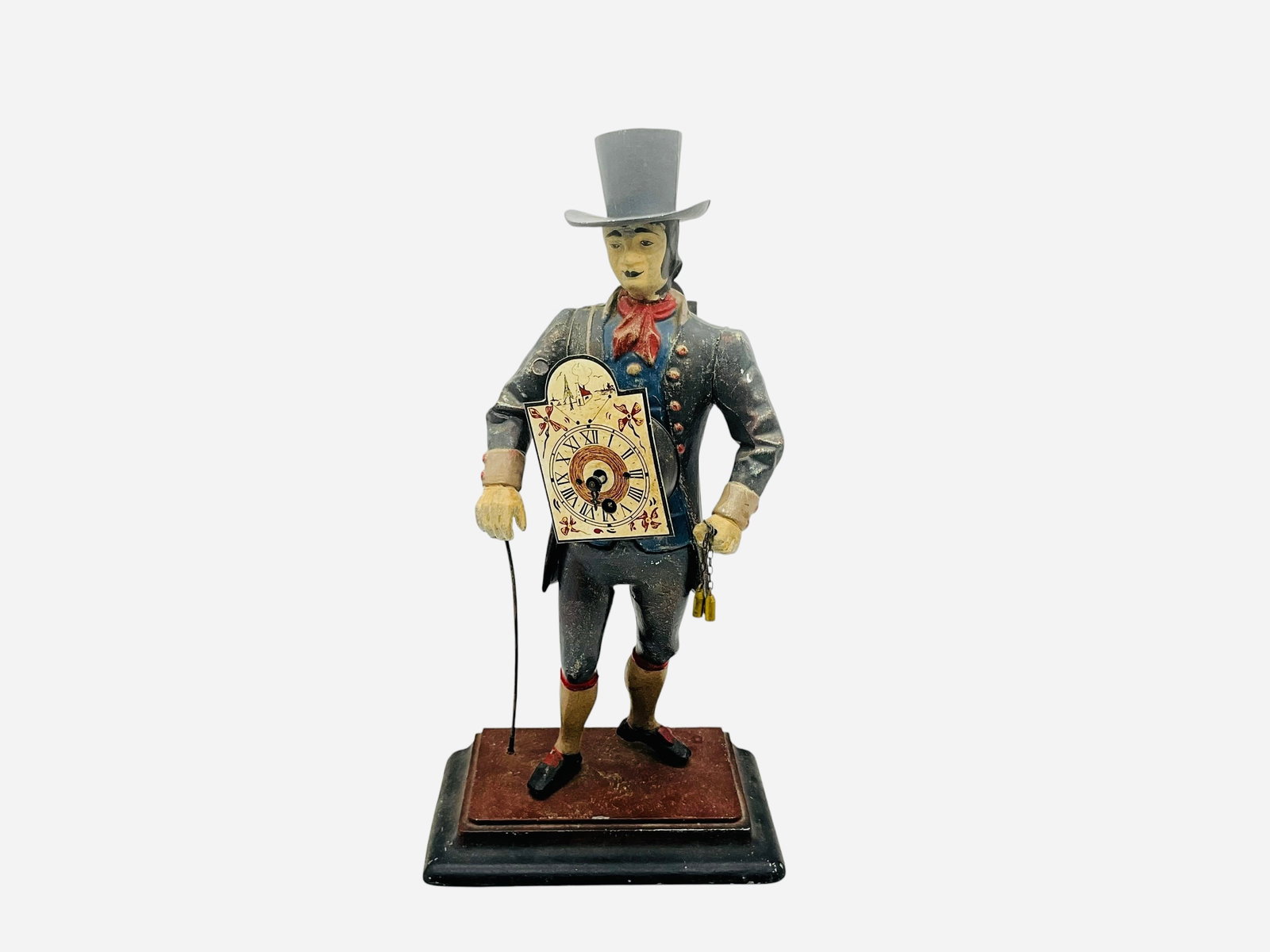 JVE Cast Iron Clock Man Peddler: Cosmetically in good condition. Stamped J.v.E. on bottom. No key. One clock hand broken. Selling as non functioning. Measures 16" x 8" x 5".