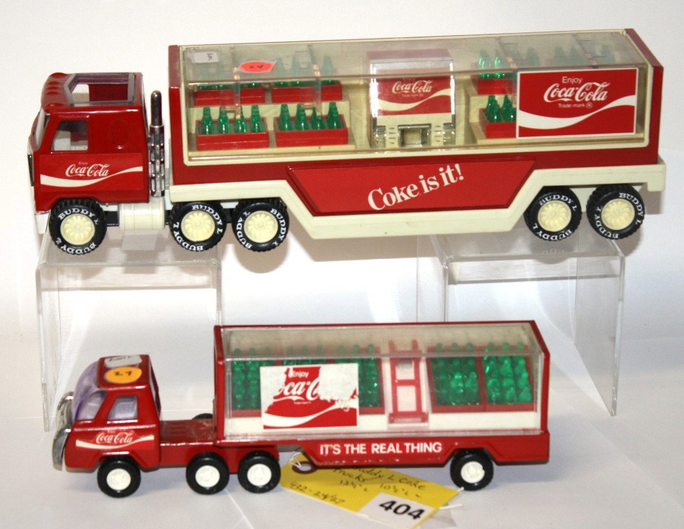 BUDDY L COKE TRUCKS: TWO BUDDY L. COKE TRUCKS, 10 1/2'' LONG & 13 1/2 LONG