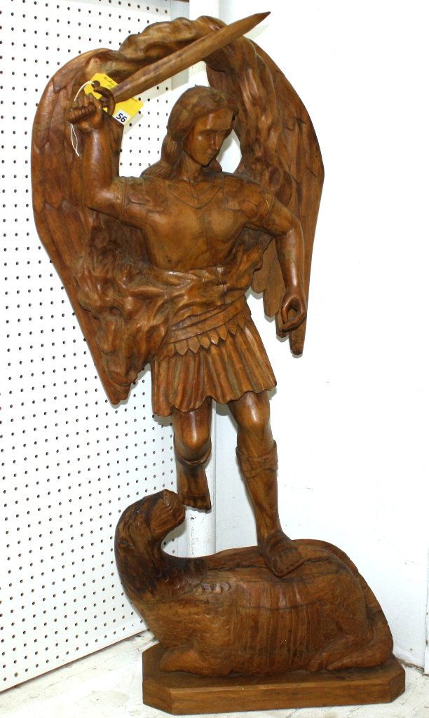 ARCHANGEL GABRIEL CARVED STATUE: LARGE WOOD CARVING OF ARCHANGEL ''GABRIEL'' WITH FOOT STANDING ON SERPENT, MEASURES 47'' X 20'', AGE UNKNOWN