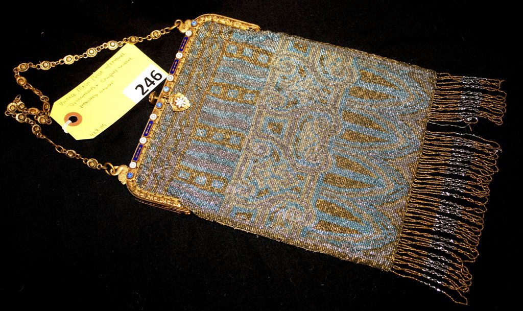 ENAMEL STEEL BEADED MESH PURSE: VINTAGE French steel micro metal beaded PURSE WITH ENAMELED FRAME & COMPACT MIRROR ATTACHED INSIDE ,MEASURES 8 1/2" X 7" SOME FRINGE DAMAGE INSIDE SILK MATERIAL IS TORN IN A FEW PLACES FROM AGE, MIRRO