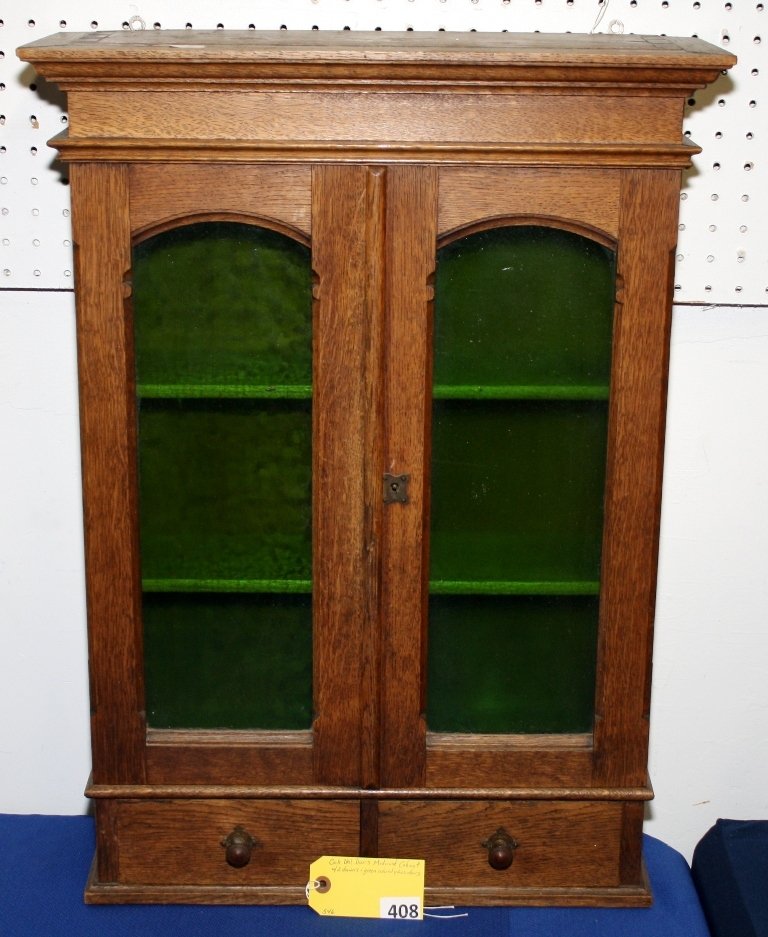 OAK MEDICENE CABINET: OAK DOUBLE DOOR MEDICENE CABINET WITH 2 DRAWERS AND GREEN COLORED GLASS DOORS