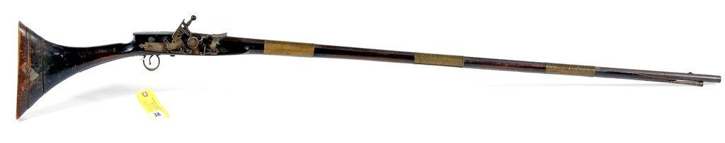 NORTH AFRICAN SNAPHENCE GUN: NORTH AFRICAN SNAPHENCE GUN, CIRCA 1800. 66'' LONG CONDITION; MINOR IMPERFECTION BUT FAIRLY GOOD OVERALL