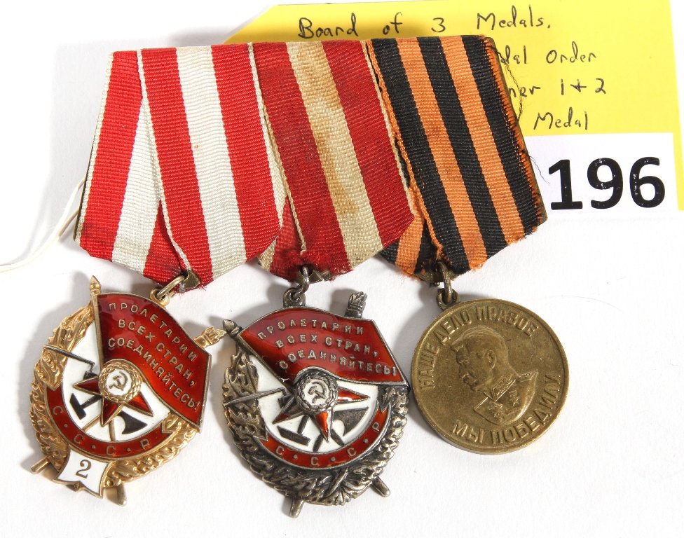 MILITARY MEDALS: BOARD OF 3 MEDALS; SOVIET RUSSIAN MEDAL ORDER BADGE RED BANNER 1&2 PLUS WWII STALIN MEDAL: MIDDLE MEDAL #298485, RED RIBBON MEDAL ON END IS #22478