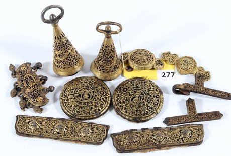 TIBETAN SADDLE DECORATION: TIBETAN SADDLE AND HARNESS ITEMS; BELL SHAPED ITEMS ARE 5 1/4" TALL BY 2 1/4" DIAMETER, 2 LONG PIECES ARE 1 1/2"X 6 1/2", 2 ROUND PIECES 3 5/8" DIA, OTHERS ARE 4 1/2", 4", 3 1/2", 4 AND 4 1/4"