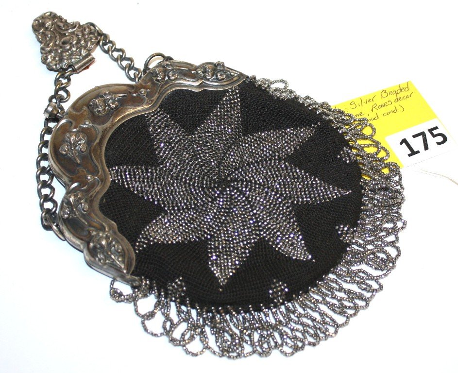 BEADED PURSE: LADIES BLACK & SILVER BEADED PURSE WITH FANCY SILVERPLATE METAL FRAME, ROSE DECORATION WITH CHAIN & CLIP, MEASURES 7'' X 6'' WIDE, GOOD CONDITION