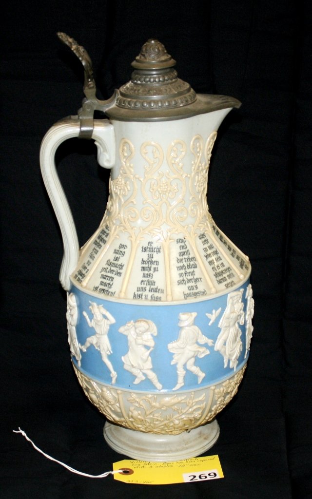 METTLACH VILLEROY BOCH STEIN: METTLACH VILLEROY BOCH STEIN, 15'' TALL, BASE HAS BEEN REPAIRED WITH 3 STAPLES