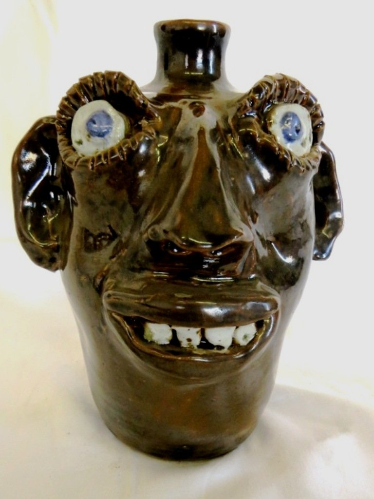 JERRY BROWN FACE JUG: FACE JUG BY JERRY BROWN MEASURING 11'' TALL SIGNED HAMILTON AL. G-99