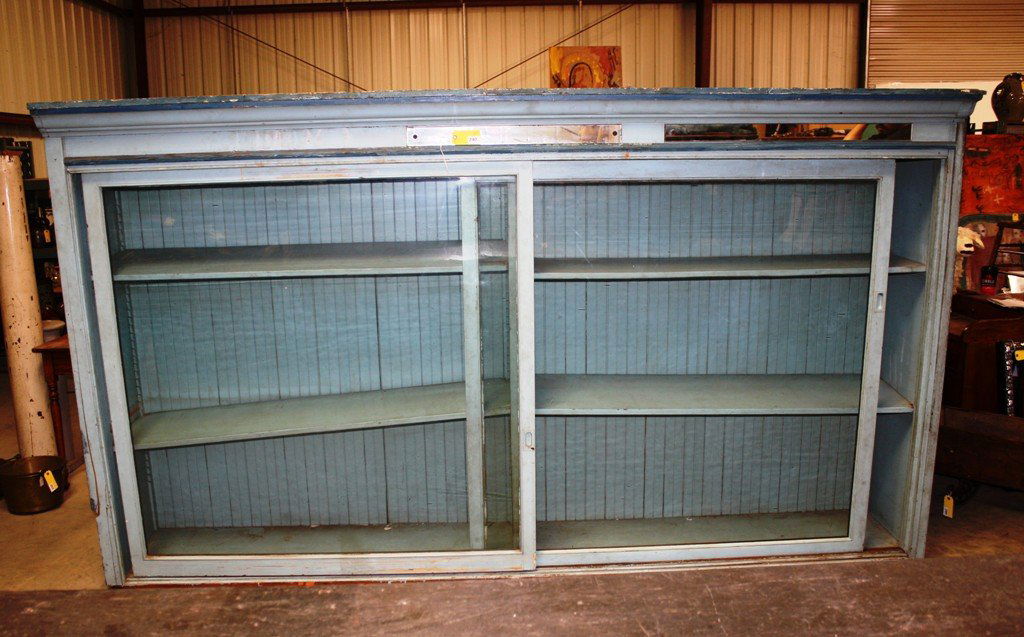 COUNTRY STORE DISPLAY CASE: LARGE COUNTRY STORE DOUBLE GLASS SLIDING DOOR DISPLAY CASE MEASURING 124'' LONG X 78'' TALL X 23'' DEEP