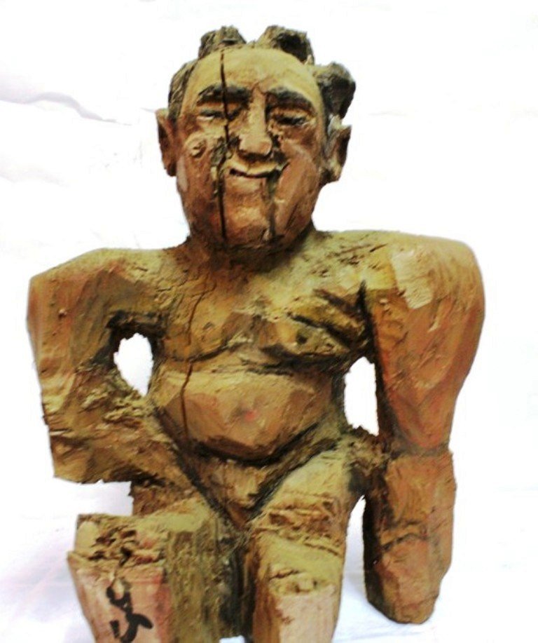 JOHN ABDULJAAMI CARVING: WOOD CARVED MAN BY JOHN ABDULJAAMI 26'' X 19''