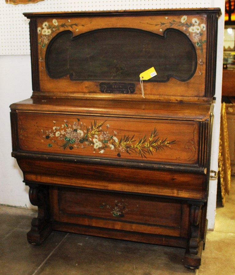 HURDY GURDY: BRUN HURDY GURDY ROLLER ORGAN THE PLAYER WAS PLAYING HERE IN THE SHOP FOR MANY YRS, IT WAS PUT IN THE CORNER, MEASURES 58 1/2" HIGH, 48" WIDE AND 25 1/2: DIAMETER. IT PLAYS SEVERAL SONGS ON THE MENU B