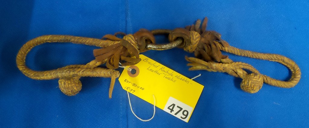RAWHIDE HOBBLES: BRAIDED RAWHIDE HOBBLES WITH LEATHER TASSLES