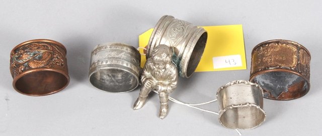NAPKIN RINGS: Figural napkin Ring, Sterling and 3 other assorted Napkin Rings