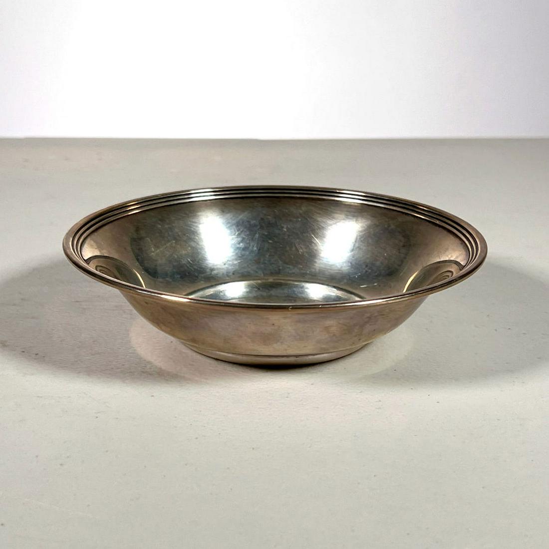 GEORGE JENSEN USA STERLING DISH: Marked "USA George Jensen Inc. Sterling" 3.87 ozt total weight - dia. 6 in. Inventory Code: 1K-204 Provenance: Part of over six-hundred Items consigned from an important Millwood, NY family