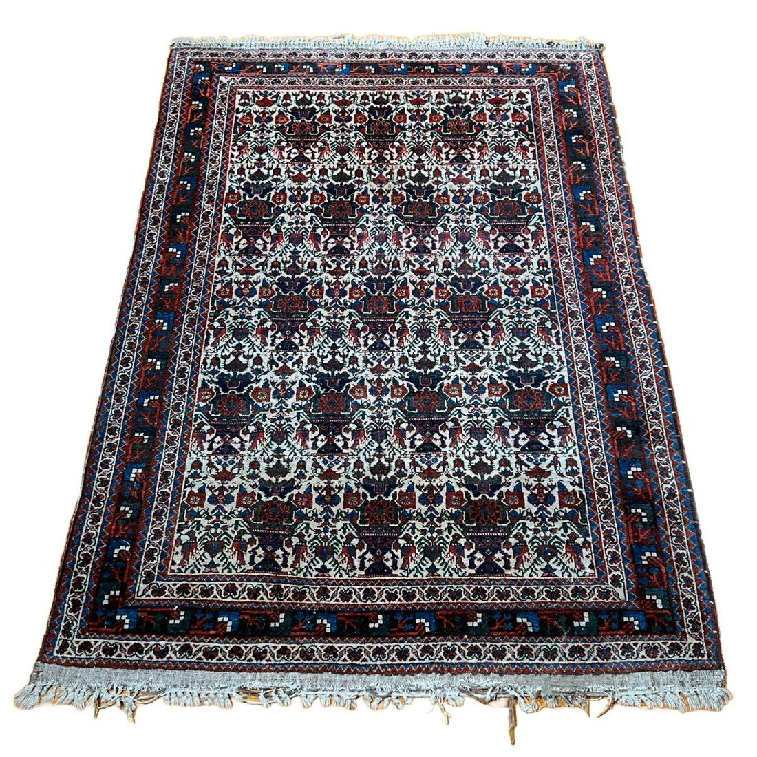EARLY 20TH CENTURY PATTERN RUG: red and ivory rug with depictions of birds and flowers. Inventory Code: 1K-74 Provenance: Part of over six-hundred Items consigned from an important Millwood, NY family