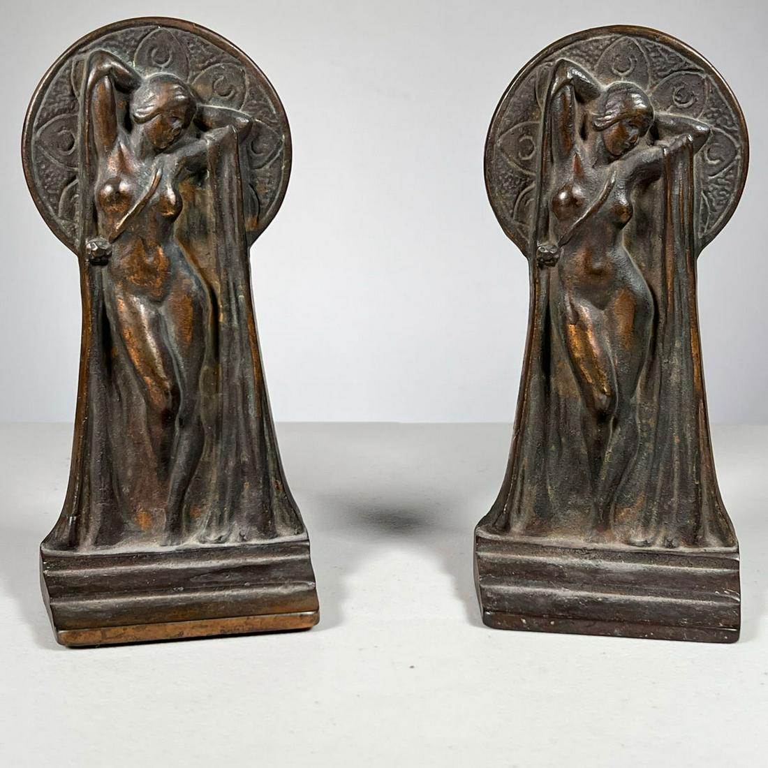 NUDE ART DECO BOOKENDS: Brass coated iron Pr of Art Deco Bookends with nude female. Inventory Code: 1K-73 Provenance: Part of over six-hundred Items consigned from an important Millwood, NY family