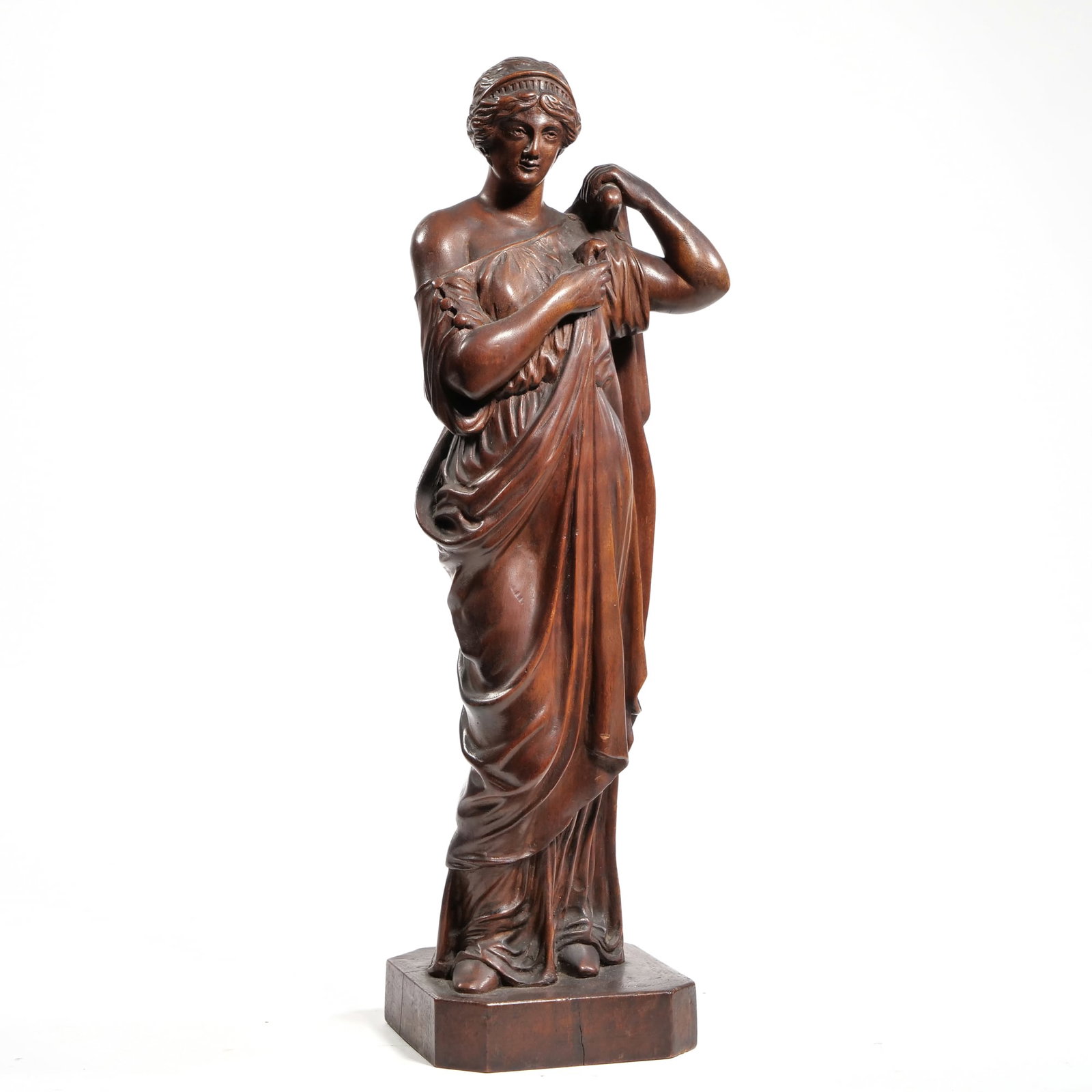 ANTIQUE CARVED WOOD FIGURE: An antique intricately carved wood figure of a woman donning a robe, no apparent signature h. 21.25 in. Provenance: Items from a period Westchester Mansion, Chappaqua, NY Inventory Code: 6C-79