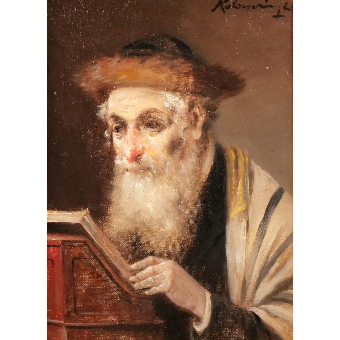LAJOS KOLOZSVARY (1871-1937): Rabbi reading with a fur hat Oil on canvas Signed upper right In a cove frame with artist's plaque 8.5 x 6.25 in. (stretcher) w. 14.25 x h. 16.25 in. (frame) Provenance: From the estate of a Rye, NY L
