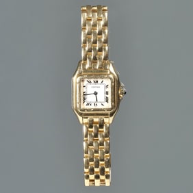 A LADIES PANTHERE DE CARTIER 18K GOLD WRISTWATCH