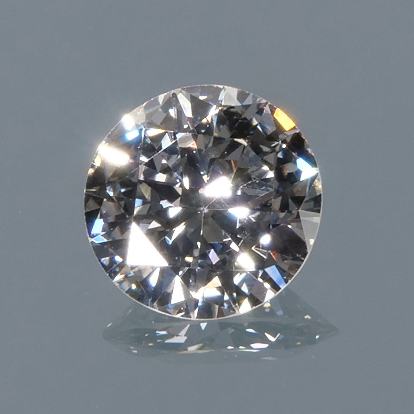 1.29 CARAT ROUND BRILLIANT DIAMOND: Accompanied by GIA Report No. 2231088197 stating the diamond as 1.29 carats (7.45 - 7.39 x 4.02), I color, SI1 clarity, and with no fluorescence. Provenance: From the estate of Scarsdale, NY lady Inve