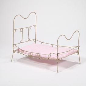 ANTIQUE METAL DOLL BED