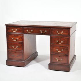 A DIMINUTIVE ENGLISH GEORGE III PEDESTAL WRITING DESK