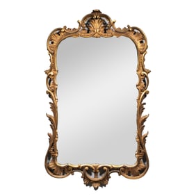 ITALIANATE GILT CARVED MIRROR WITH SHELL DEVICES