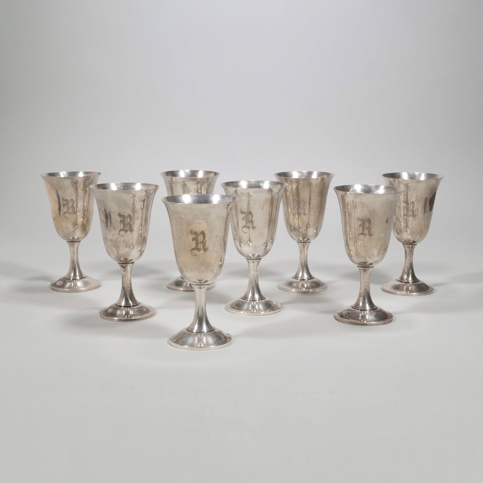 (8pc) FISHER STERLING SILVER GOBLETS: Monogrammed "R", stamped "Fisher Sterling 62" on bottom; all together 40.9 ozt h. 6.5 x dia. 3.5 in. Provenance: From the waterfront estate of Lillian & Lester Giegerich, Darien, CT