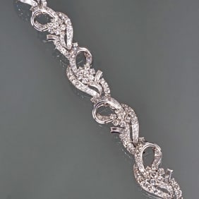 DIAMOND & 14K WHITE GOLD RIBBON FORM BRACELET
