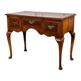 A GEORGE II WALNUT DRESSING TABLE