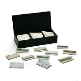"THE WALLET" BOX OF LOOSE DIAMONDS IN VARYING SIZES