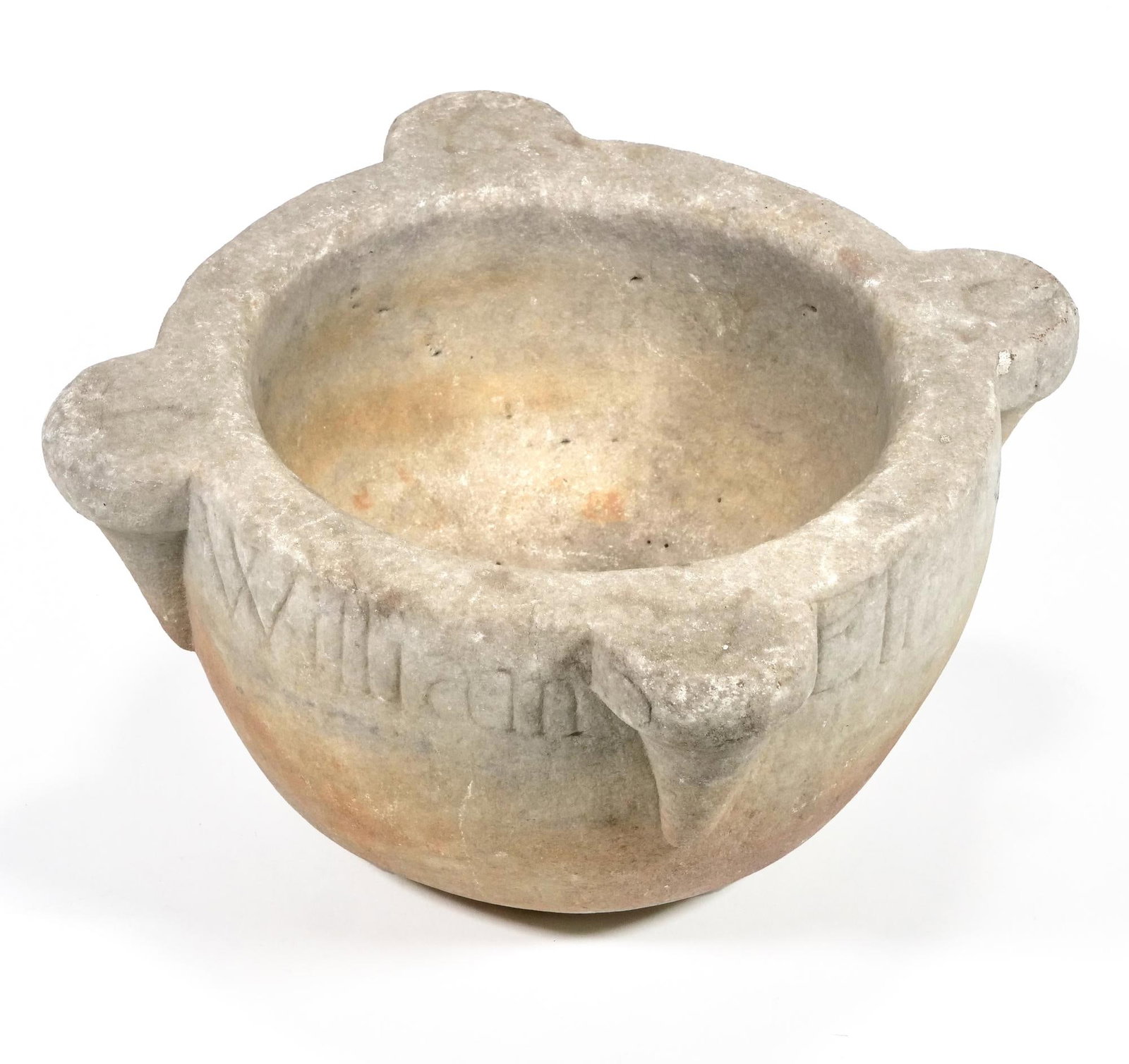 EARLY 18TH CENTURY CARVED STONE MORTAR INSCRIBED SWAINE, WILLIAM & ELIZABETH, DATED 1709: Carved white-to-buff stone mortar with four outset lug handles terminating in rounded tabs. Hemispherical bowl with recessed ring foot. Incised lettering on exterior: one face reads "Morter"; other fa
