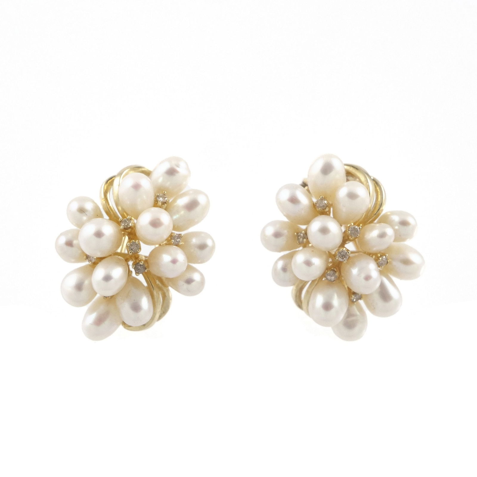 PAIR 14K GOLD & PEARL CLUSTER EARRINGS: Each earring designed as a cluster of elongated pearls set with 7 melee diamonds and omega backs, with 14k fineness mark; 10.3g